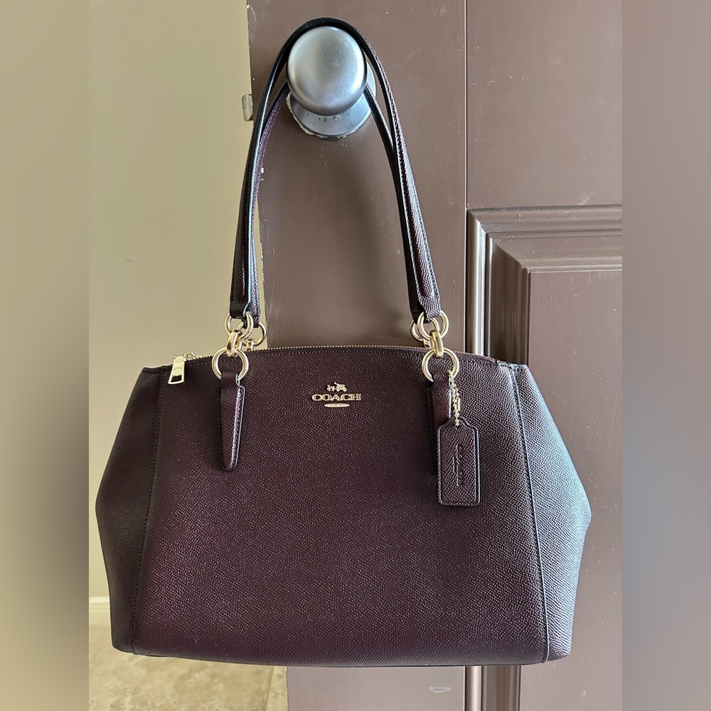 Coach Christie Carryall in brown/oxblood crossgrain leather.